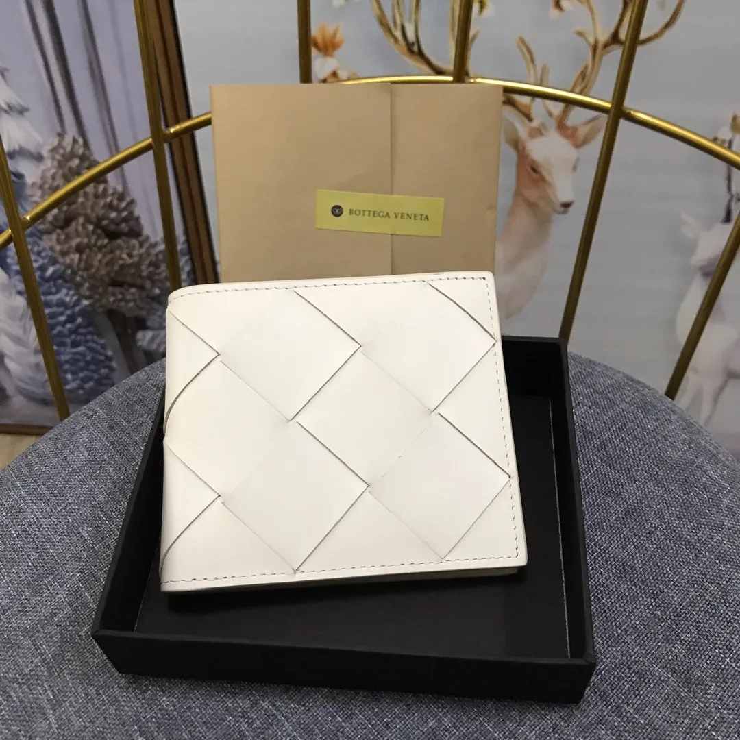Padded leather wallet • 8 card slots, 1 bill compartment and 2 additional compartments • Check pattern nappa padding exterior • Smooth calfskin lining 993#